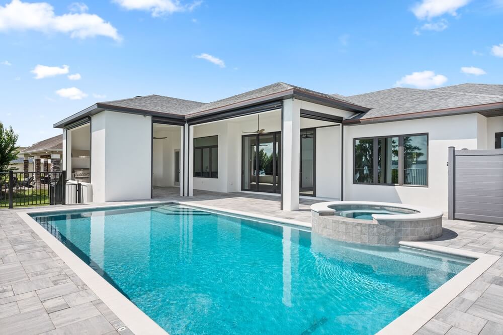 Custom home pool and covered outdoor patio built by Highland Homes in Mount Dora, FL